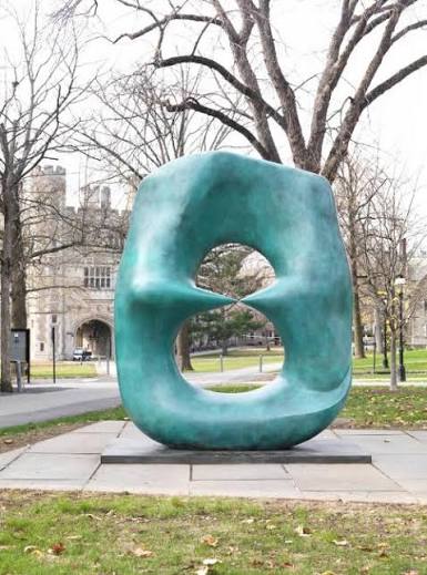 Henry Moore's green bronze Oval with Points on the campus lawn